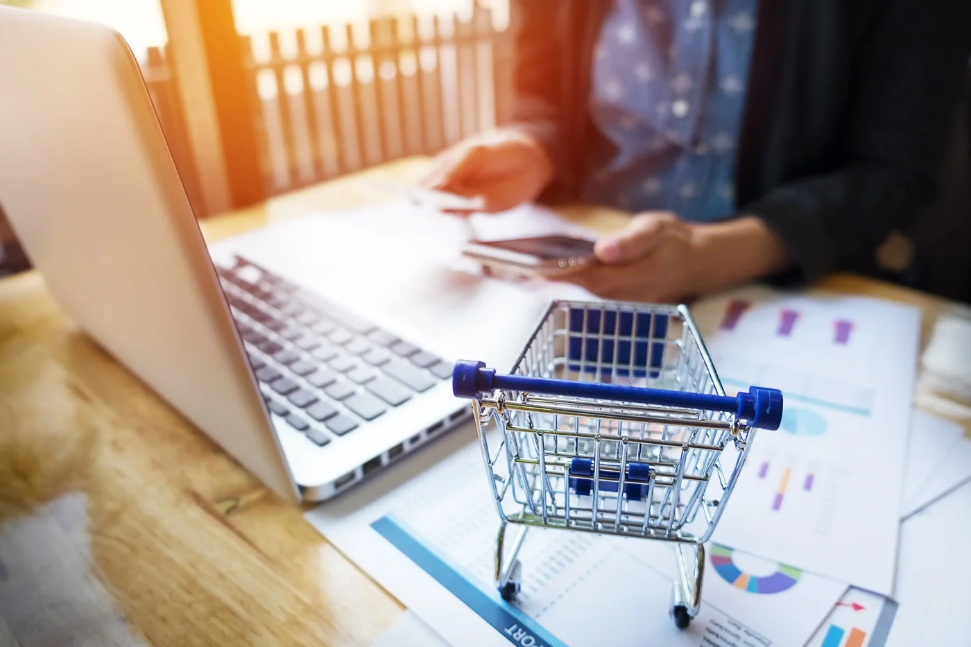 cropped-image-woman-inputting-card-information-key-phone-laptop-while-shopping-online.webp