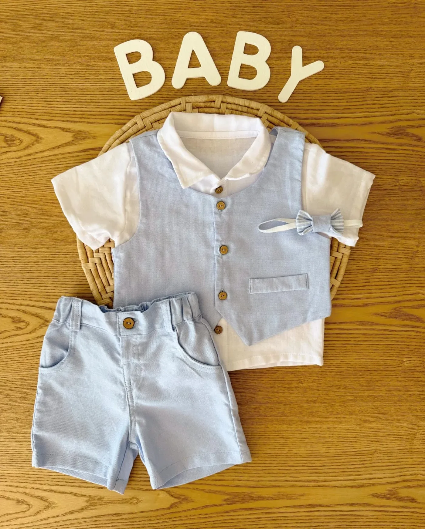 conjunto-elegante-para-nino-con-camisa-chaleco-corbatin-y-bermuda-en-color-celes_babyrex_01_8218d6dc.webp