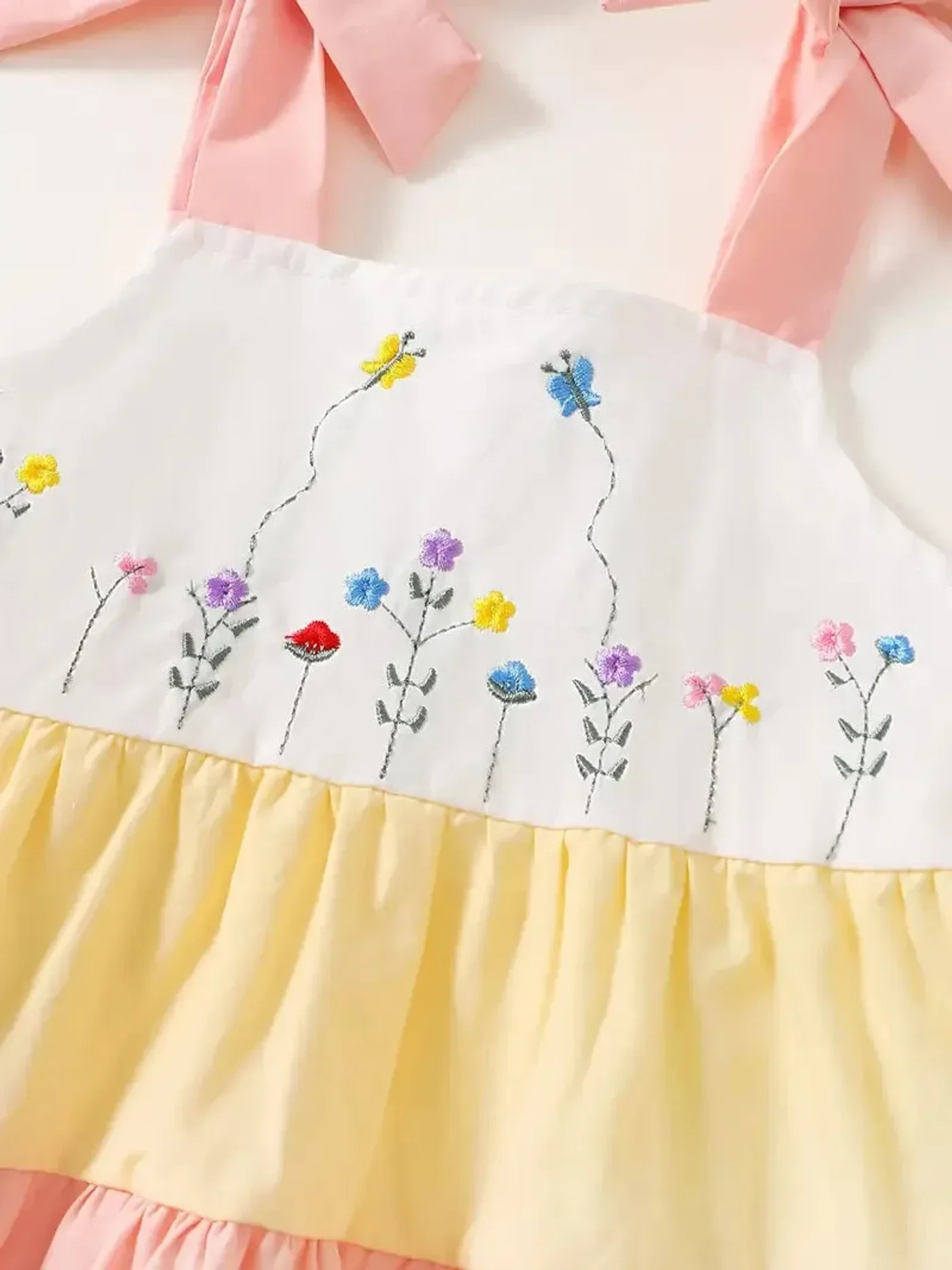 vestido-arcoiris-amarillo-azul-rosado_babyrex_02_59d6d4a5.webp