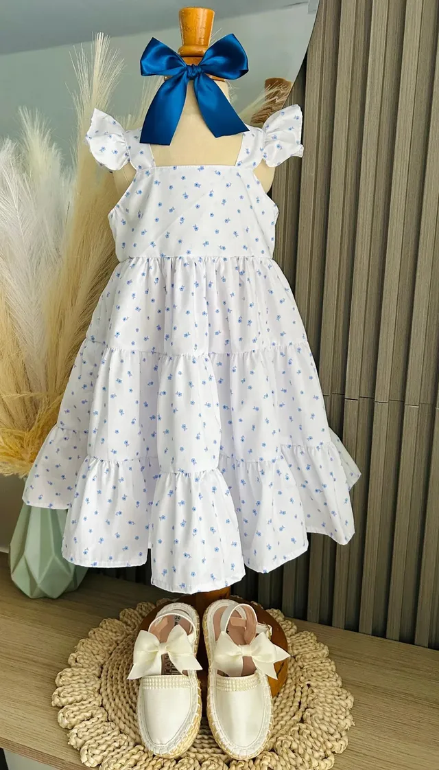 vestido-blanco-con-flores-azules-para-nina_babyrex_02_a3dcb7b6.webp