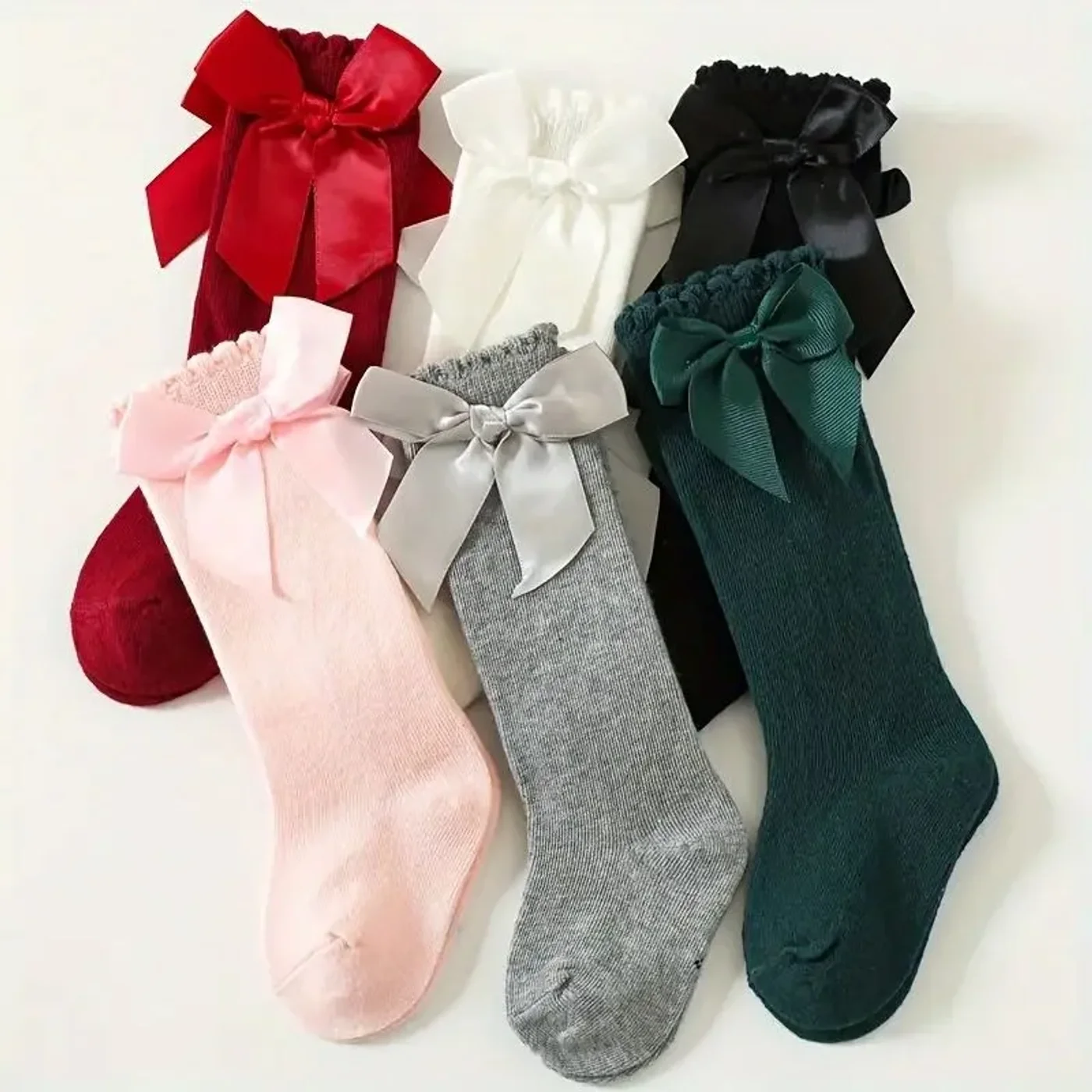 medias-espanola-larga-con-mono-de-nina-variedad-de-colores_babyrex_01_c76fc49d.webp