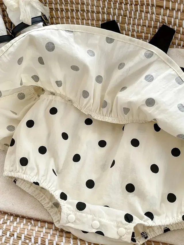 vestido-beige-con-pepitas-negras-con-cubre-panal-interno_babyrex_02_4358c96f.webp