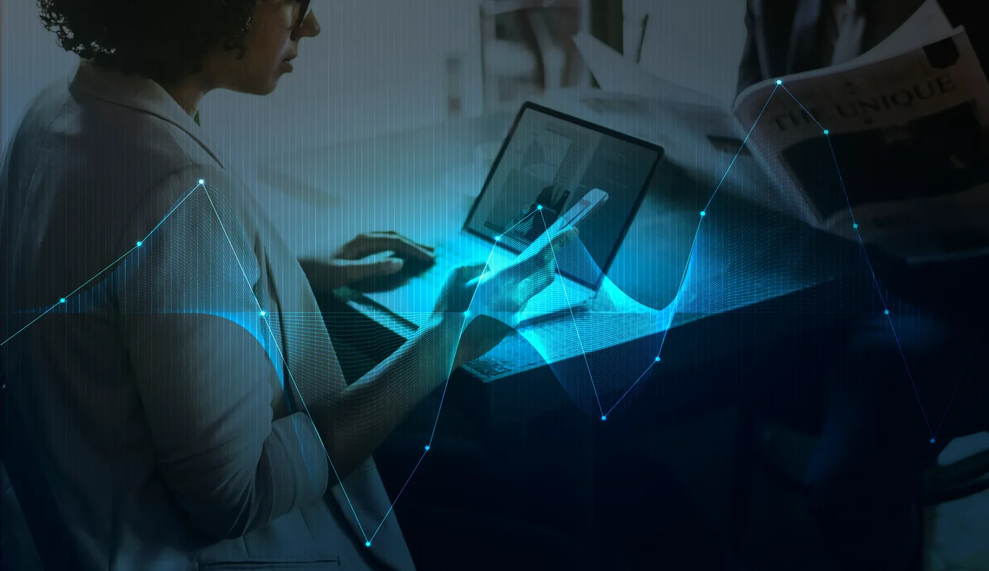 businesswoman-networking-using-digital-devices.webp